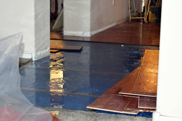 Professional Flood Damage Restoration technician working in Red Rock, TX